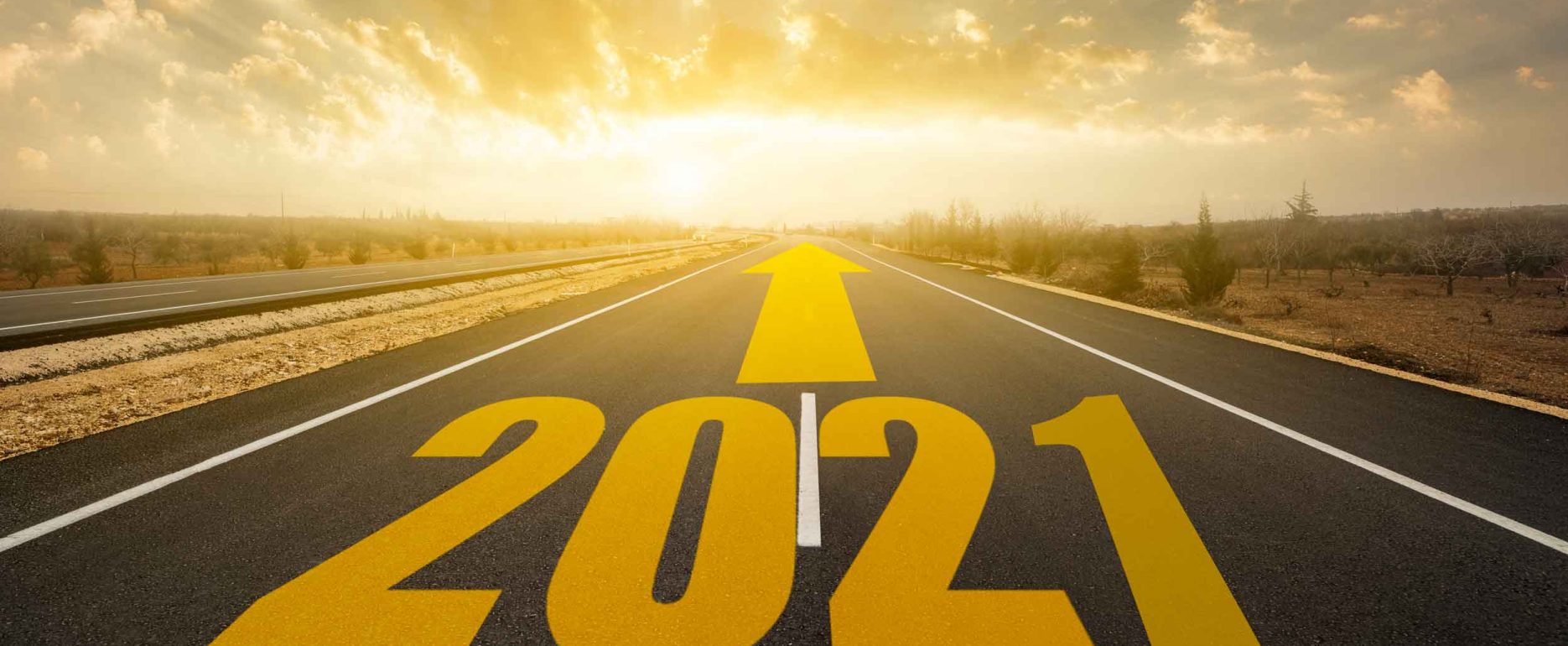 2021 and Yellow arrow on a road