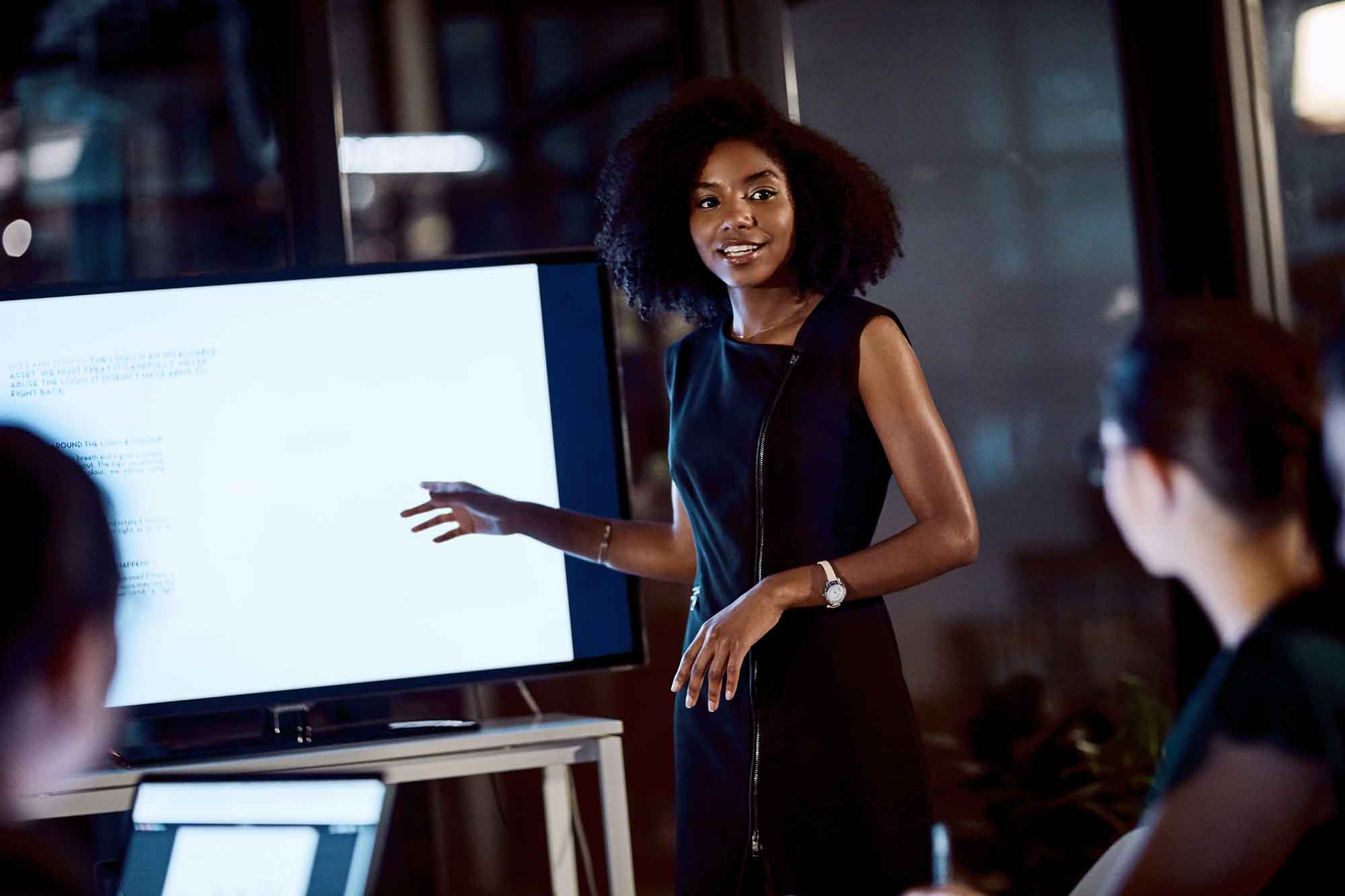 young businesswoman delivering a presentation