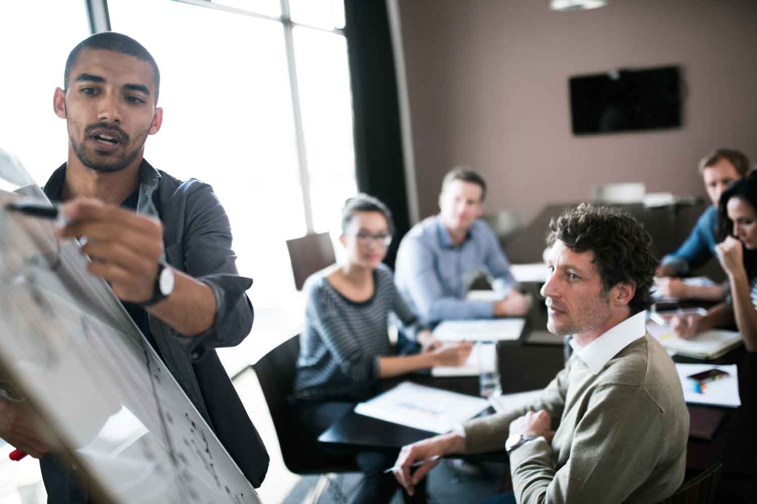 Group of people brainstorming together