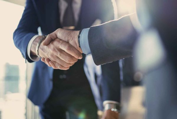 Closeup - businessman shaking hands