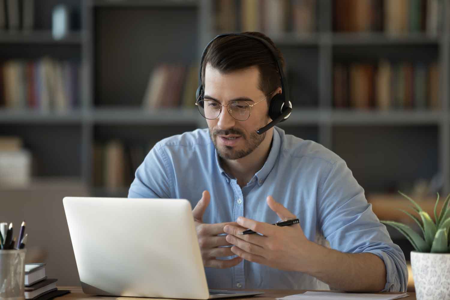 man wearing headset during a video call
