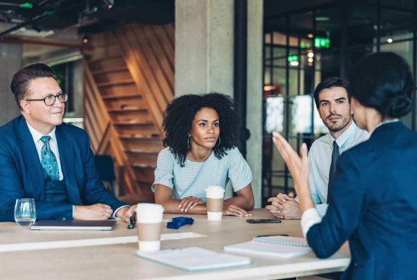 Multi-ethnic group of people discussing business