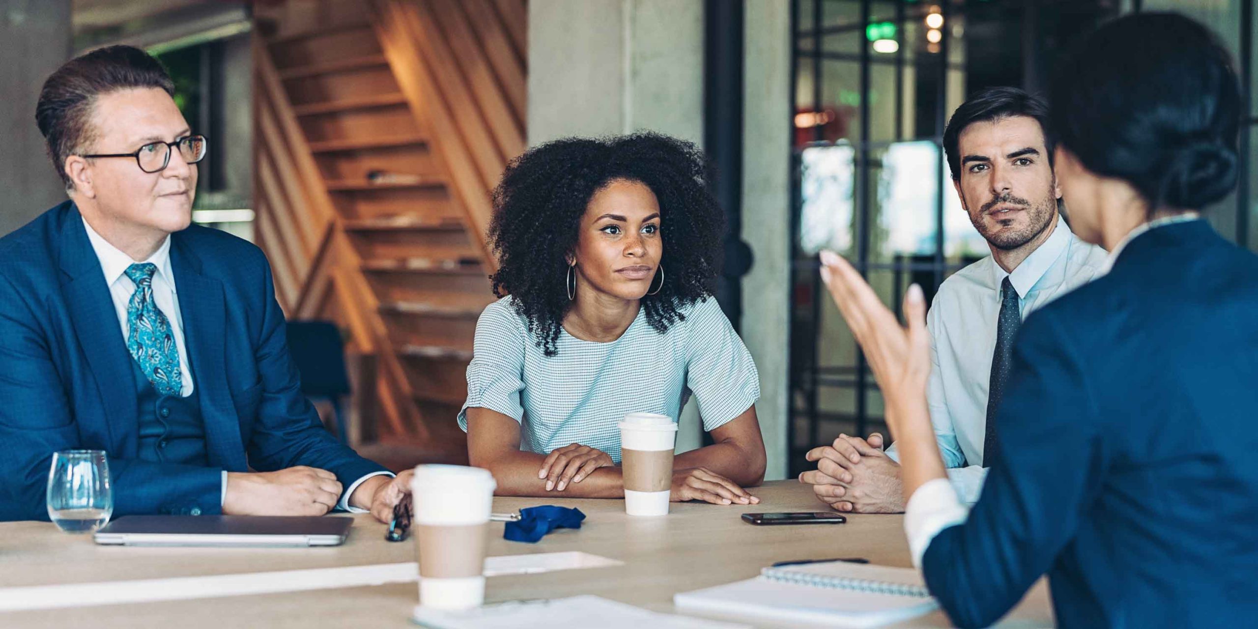 Multi-ethnic group of people discussing business