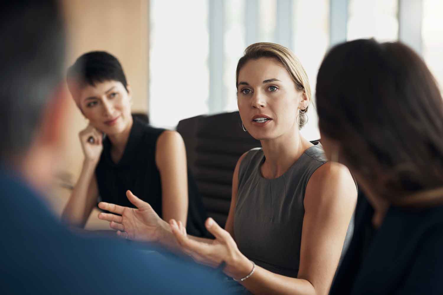 business woman talking during a corporate meeting