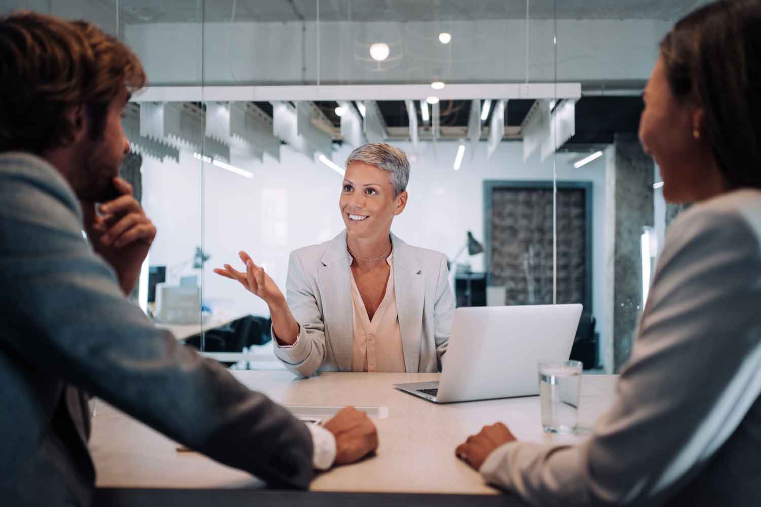 Group of business persons talking in the office