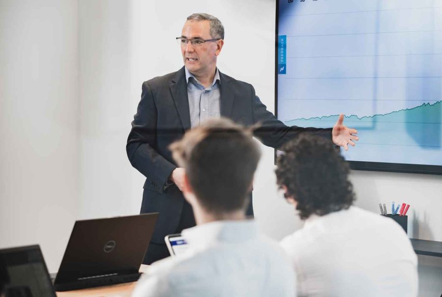 David delivering a presentation to his colleagues